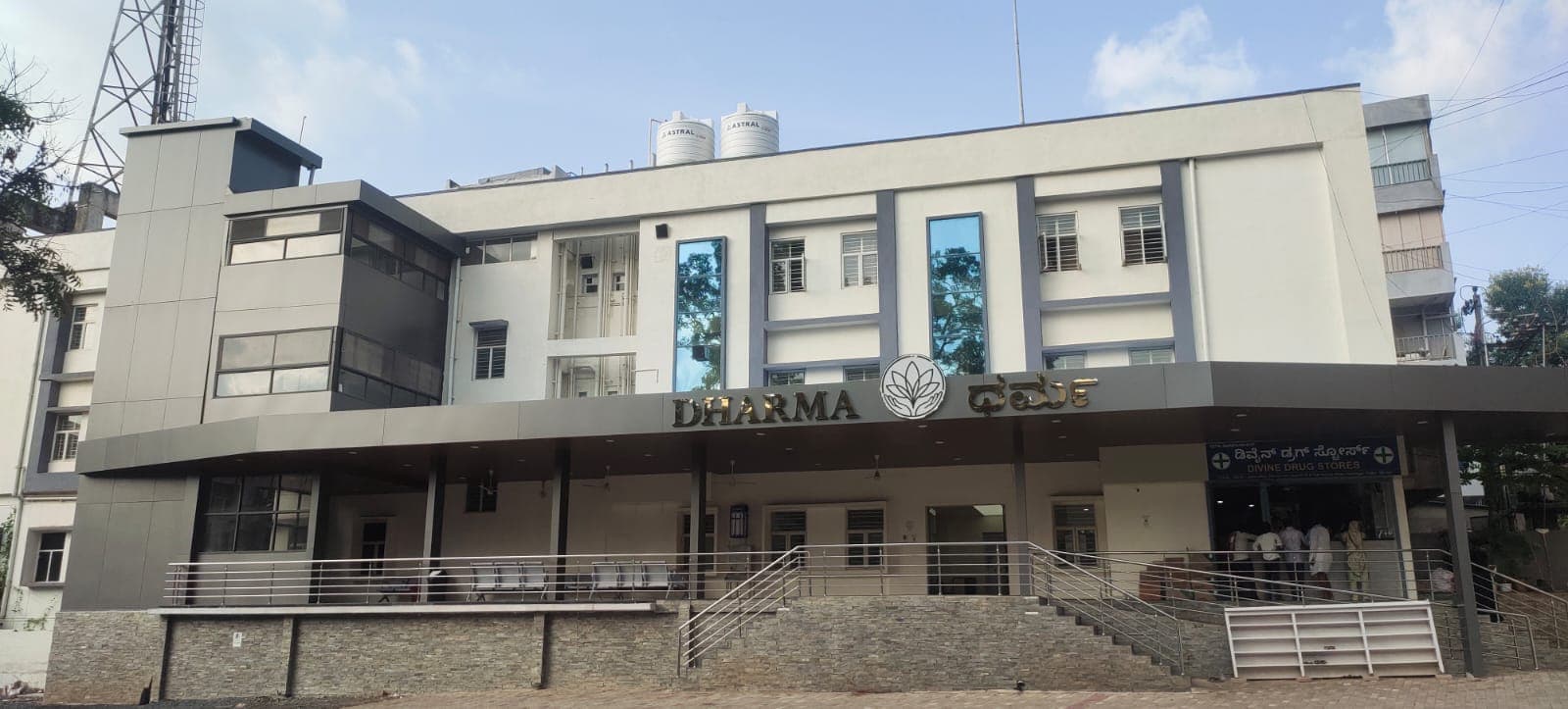 Dharma building with Divine Drug Stores pharmacy in Hubli